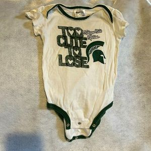 Michigan State “too cute to lose” 6-9 month onesie. Runs big.